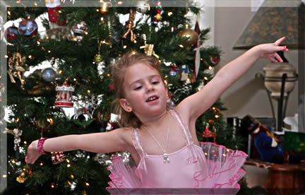 In her ballerina tutu- she loves to dance