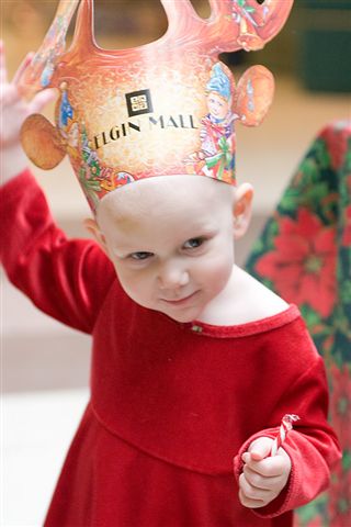 Olivia gets a hat & candy cane